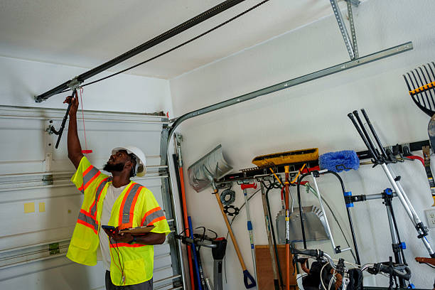 Professional Garage Door Installation technician working in Brownsville, KY